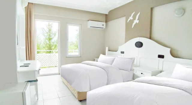 Standardowy rodzinny pokój UK Hotels Kiriş