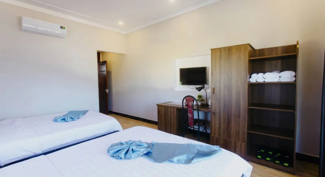 Четырёхместный номер Deluxe с балконом и с видом на город Home River Villa