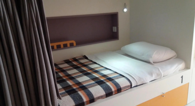 Кровать в общем номере Sakura Hostel & Pub