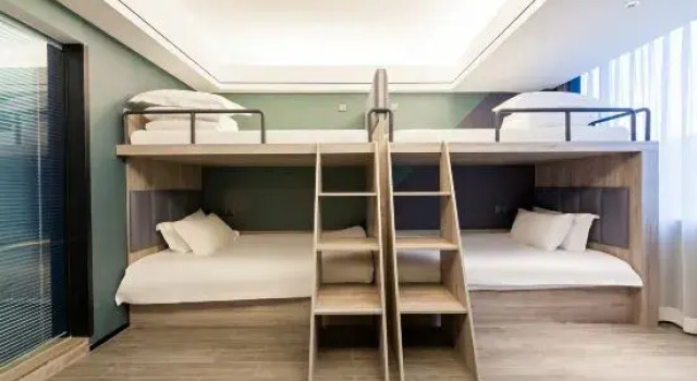 Кровать в общем номере Xinyuan E-Sport Hotel
