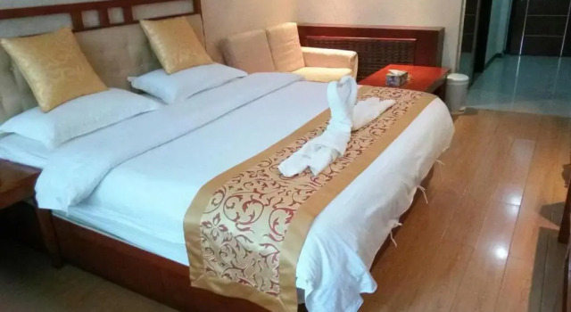 Номер Deluxe Xinjinshan Yijia Condo Hotel