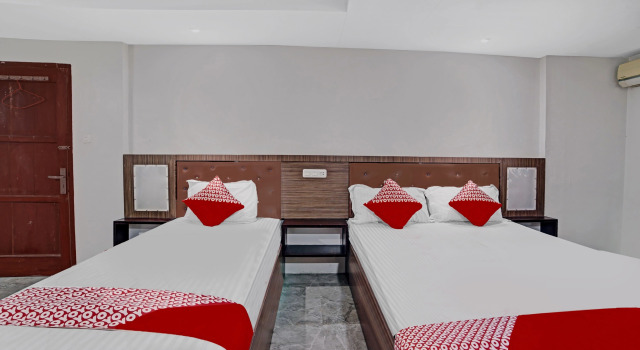Трёхместный люкс Hotel O Wisma Kuta Karang Baru