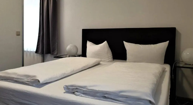 Camera Economy Hotel Wolke