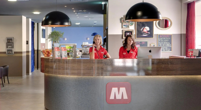 Кровать в общем номере MEININGER Hotel Salzburg City Center