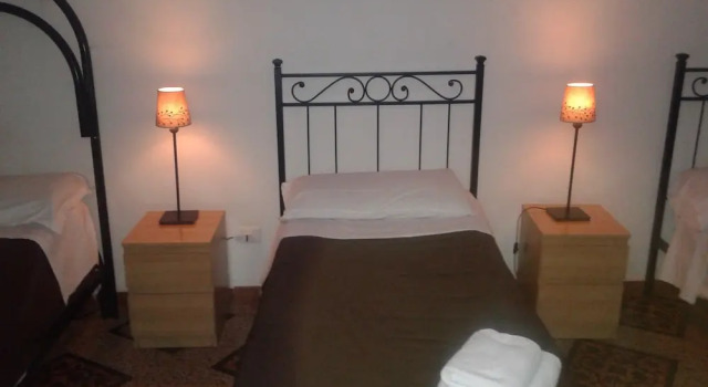 Кровать в общем номере Hostel Castello Maggiore