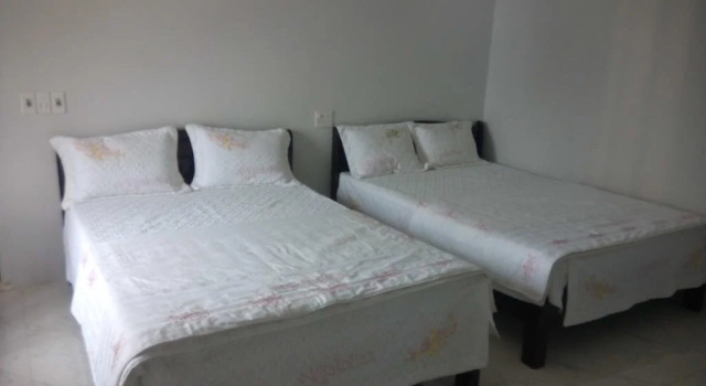 Ngoc Hang Hotel by OYO, Забронировать Отель Лангко 