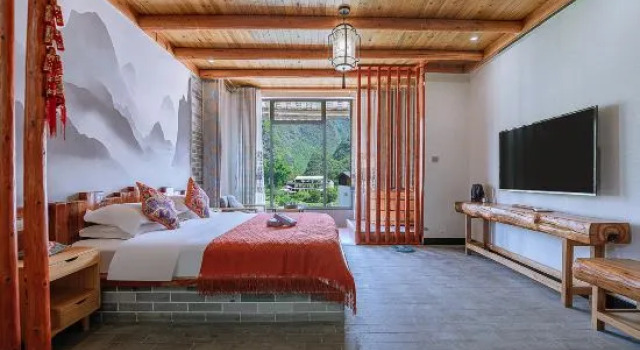 Семейный люкс с 3 комнатами Qingju Caotang Homestay (Yangshuo Yulong River Jima Wharf Branch)