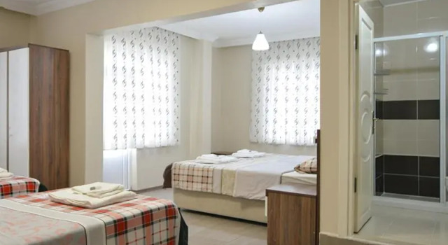 Четырёхместный номер Standard Ozdogan Otel Pansiyon