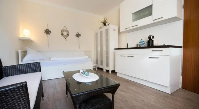 Апартаменты Ferienwohnung strandnah im Haus Frauenpreiss 56