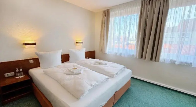 Двухместный номер Standard c 1 комнатой REGIOHOTEL Bunte Stadt Wernigerode