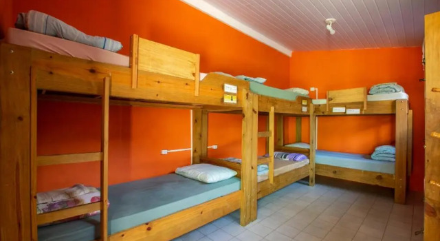 Кровать в общем номере Geckos Hostel