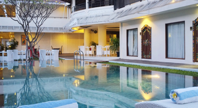 Кровать в общем номере Asana Agung Putra Bali