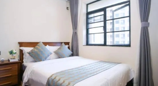 Люкс с 3 комнатами Manli Holiday Apartment(Guanlan Lake New Town in Haikou)