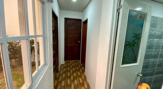 Кровать в общем номере Lanas Beach Resort Carabao Island