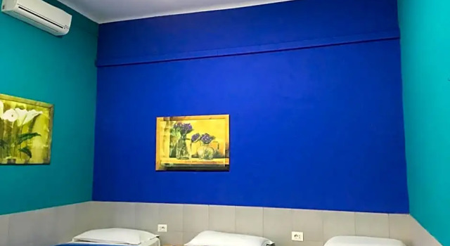 Кровать в общем номере Volturno House
