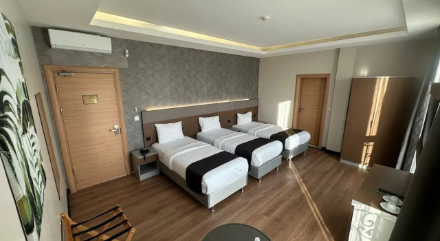 Трёхместный номер Deluxe Niconya Port Suite&Hotel