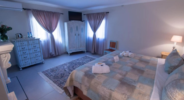 Pluvio, Buchen Sie Hotel Parys Freistaat