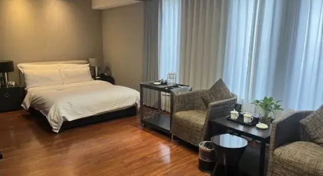 Номер Economy Qingdao Housing International Hotel