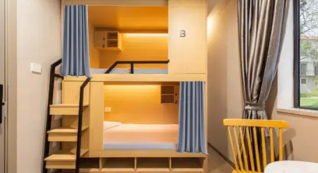 Кровать в общем номере (женский номер) ORAN HOTEL（Jiang Nan Xi And Bao Gang Da Dao Subway Station)