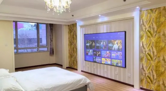 Семейный люкс Deluxe Tianjin Manju Seaview Projection Apartment (Haiboguan Branch)