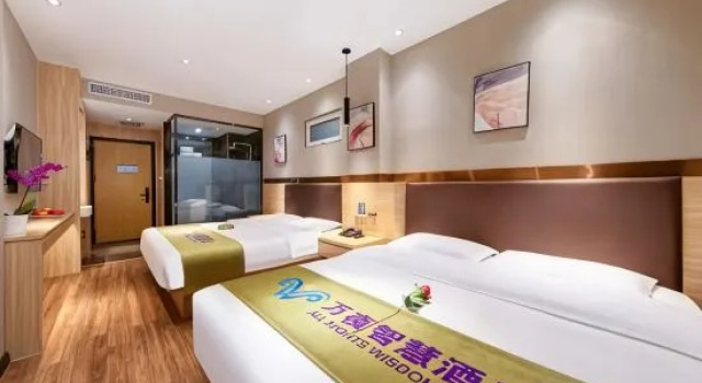 Кровать в общем номере Wan ye hotel