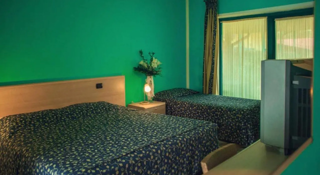 Трёхместный номер Hotel Ristorante La Perla