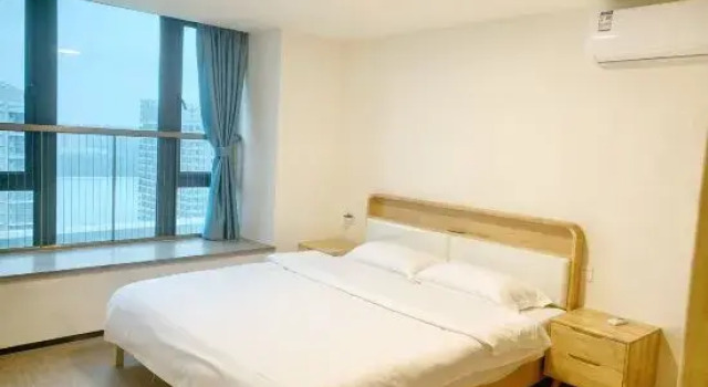 Люкс с 3 комнатами с видом на море Danzhou Mingyang Homestay