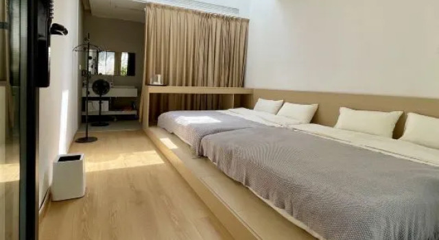 Кровать в общем номере HHHO Tree House B&B (Badaling Water Gate Great Wall Branch)