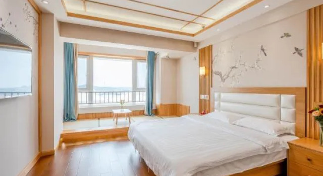 Люкс Xinyue Bay Seaview Apartment Hotel (Shibei Bay Dream Water Park Branch)