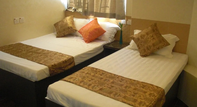 Трёхместный номер Standard Dynasty Commercial Hotel