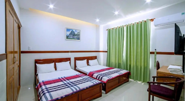 Номер Standard Khách Sạn Quốc Cường-Dì Tám