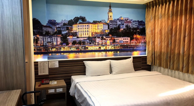Номер Economy Lotus Yuan Business Hotel