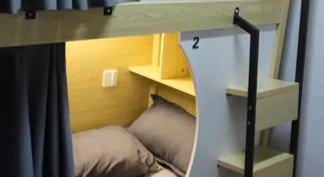 Кровать в общем номере Qingyu Youth Hostel