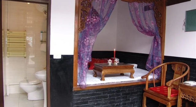 Pingyao Xing Long Yi Guesthouse, Забронировать Отель Отели Пинъяо с парковкой, рядом с Ji's Old Residence, Парковка