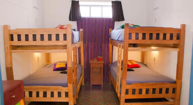 Кровать в общем номере Casa Blanca Hostel