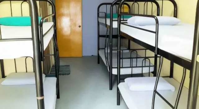 Кровать в общем номере Sandakan Backpackers Hostel