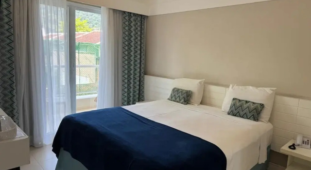 Апартаменты The Falls Hotel - Frente mar