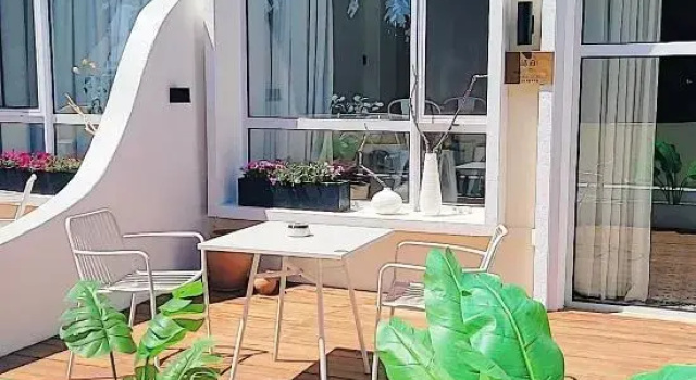 Кровать в общем номере Dalian Jiuqi Blue Coast B&B