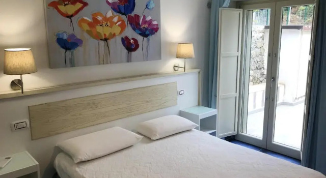 2 bedrooms house at Maratea 50 m away from the beach with sea view enclosed garden and wifi
