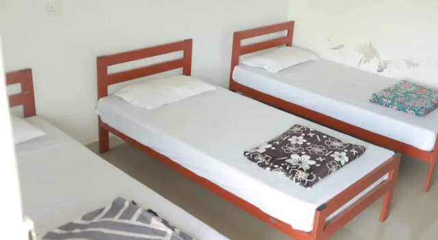 Кровать в общем номере ASHRAMAM HEALTH RESORT