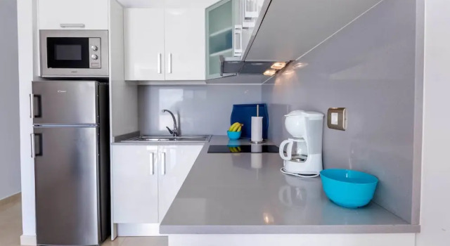 Кровать в общем номере с балконом Apartamentos Portonovo