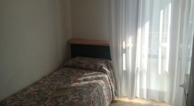Четырёхместный номер Standard с балконом Hotel MaxiHeron