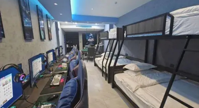 Кровать в общем номере Huohu E-sports Homestay