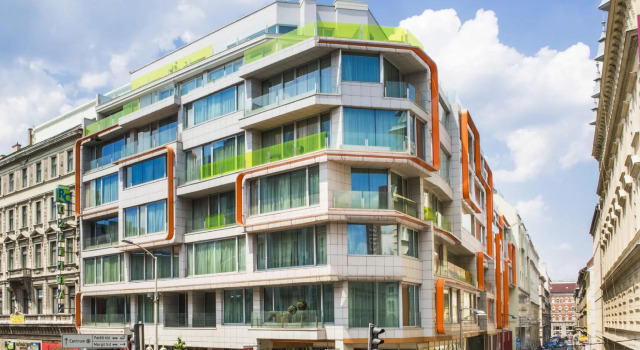 Кровать в общем номере NH Collection Budapest City Center
