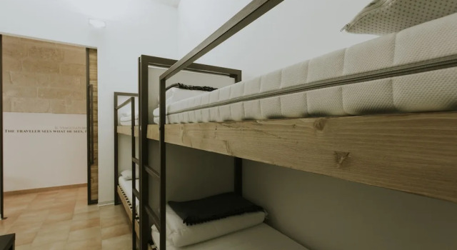 Cama en dormitorio compartido 2 dormitorios Ostello dei Sassi - Matera Hostels