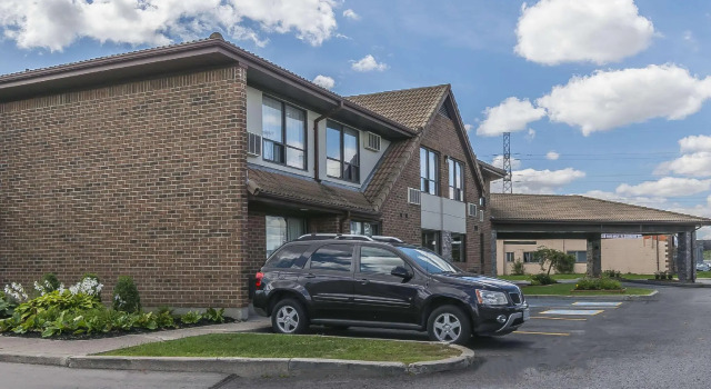 Четырёхместный номер Standard Spark by Hilton Oshawa