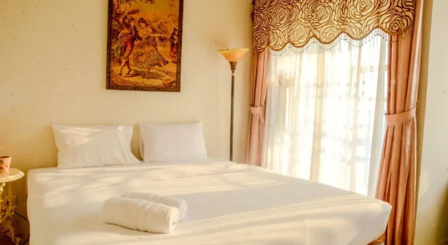 1 Vintage Bedroom at Cosmo Terrace Apartment by Travelio, Book Apartment Kemayoran Jakarta