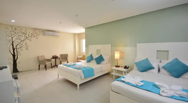 Номер Deluxe Holiday Suites Business District - formerly Empire Suites Hotel