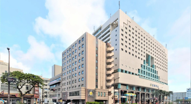 Кровать в общем номере Smile Hotel Okinawa Naha