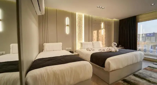 Семейный номер Deluxe Pyramids Charm Hotel